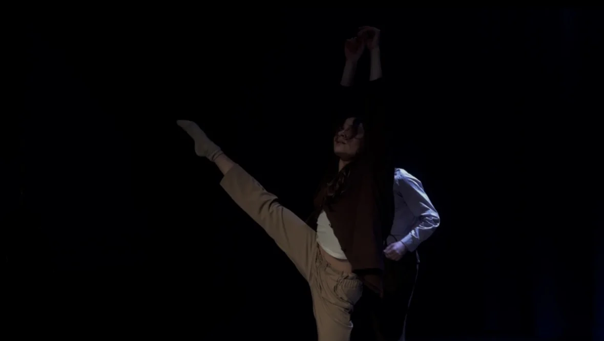 Aubade dancers extending through a shared phrase